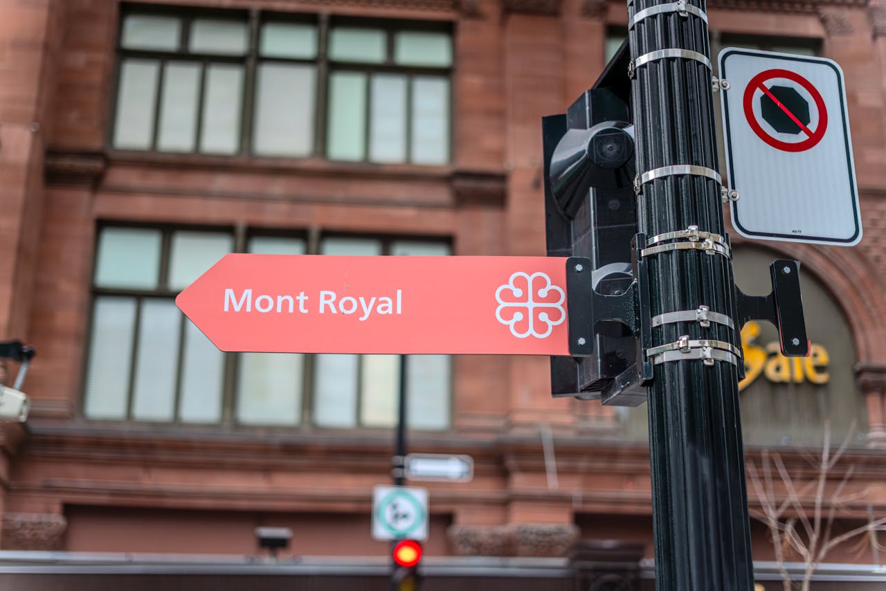 A directional street sign pointing to Mont Royal in downtown Montreal, Canada.